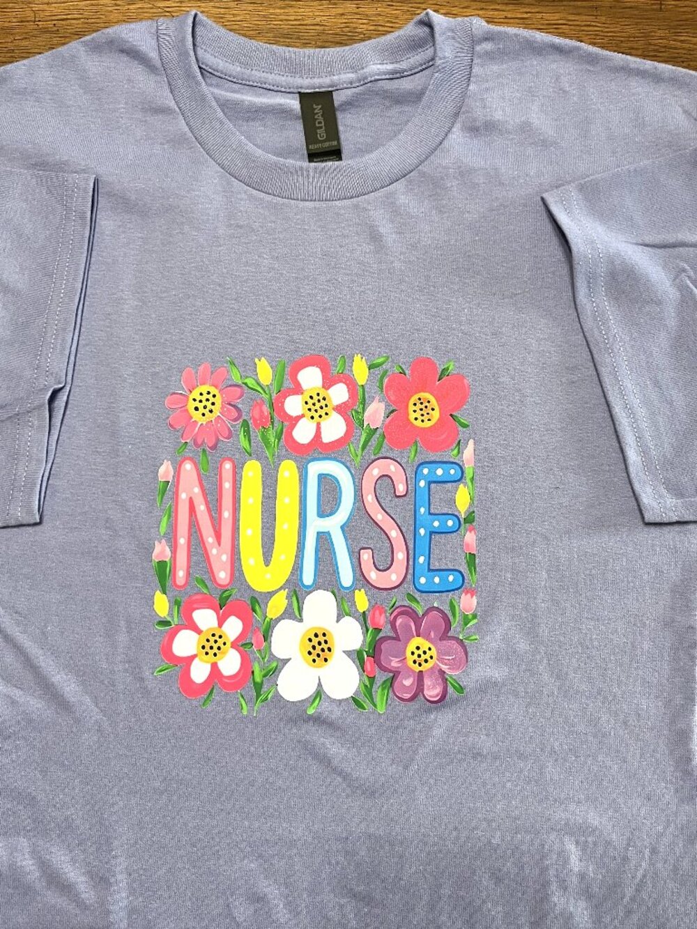 Women Nurse Lavender Flower T-Shirt Size: Large very nice